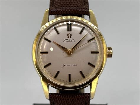 omega seamaster gold cap|Omega Seamaster unisex.